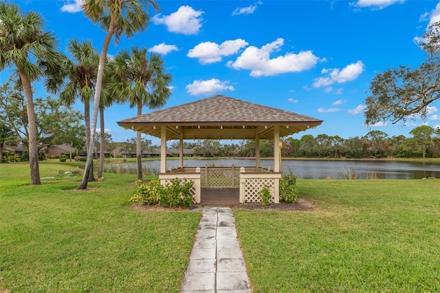 view of yard featuring a gazebo and a water view