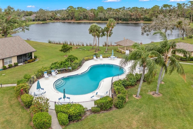 view of swimming pool with a gazebo, a lawn, and a water view