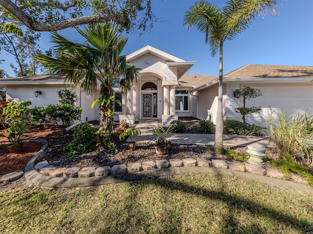 view of front of house with a garage