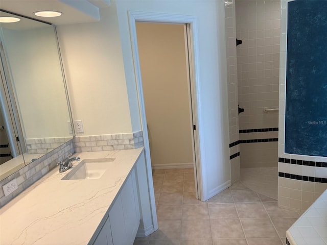 1093 Laurel Woods Dr, Nokomis, FL 34275 - bathroom with vanity, tile patterned floors, and a tile shower