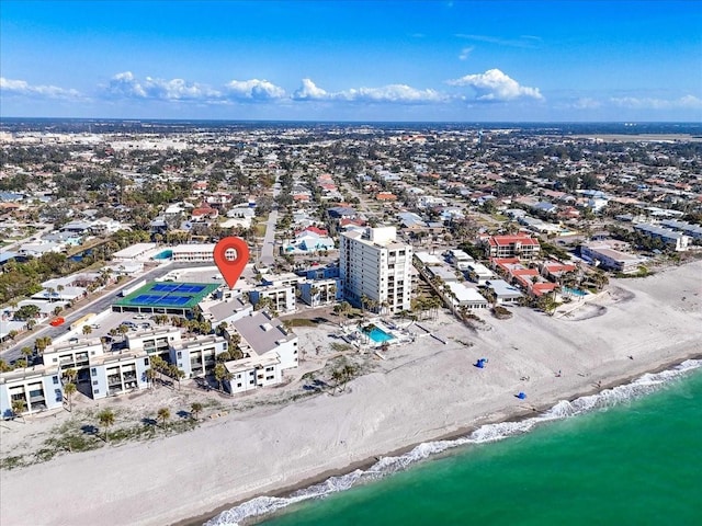 birds eye view of property featuring a view of the beach and a water view