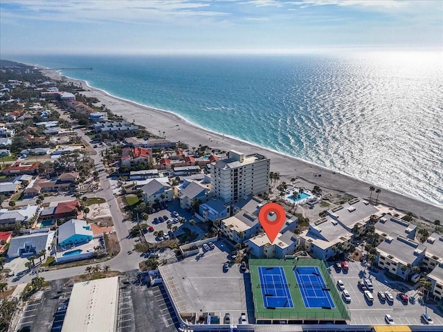 aerial view with a view of the beach and a water view