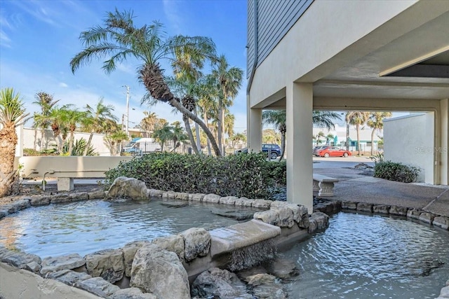 view of yard with pool water feature