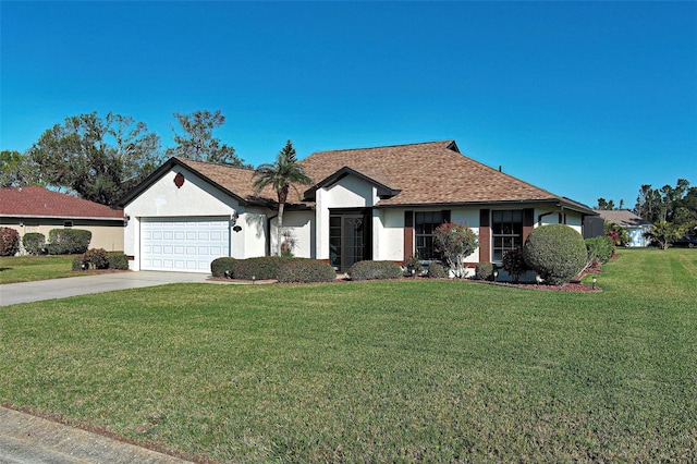 single story home with a garage and a front lawn