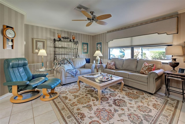 tiled living room featuring crown molding and ceiling fan