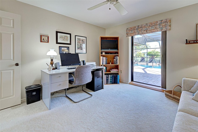 home office with light colored carpet and ceiling fan