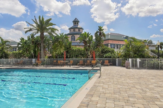 view of pool featuring a patio