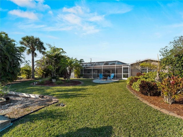 view of yard with a lanai