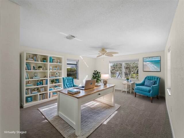 18053 Cullman Ave, Port Charlotte, FL 33948 - carpeted office space featuring ceiling fan, baseboards, visible vents, and a textured ceiling