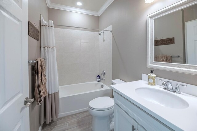 full bathroom with vanity, toilet, crown molding, and shower / bath combo with shower curtain