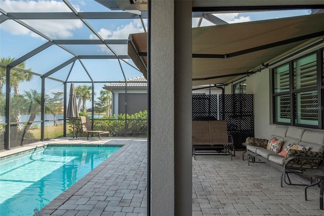 view of swimming pool with a water view, an outdoor hangout area, glass enclosure, and a patio area