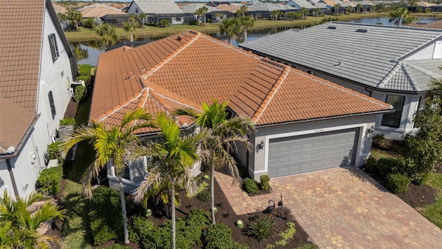 bird's eye view with a water view