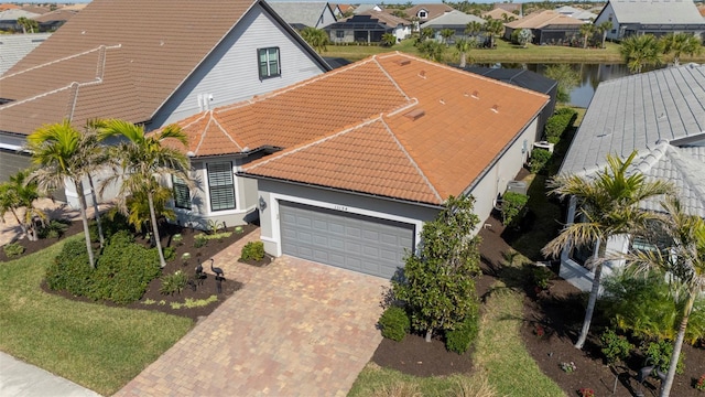 drone / aerial view featuring a water view