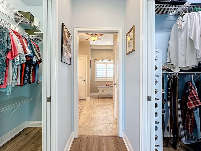 walk in closet featuring light wood-type flooring