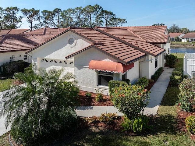 exterior space featuring a water view