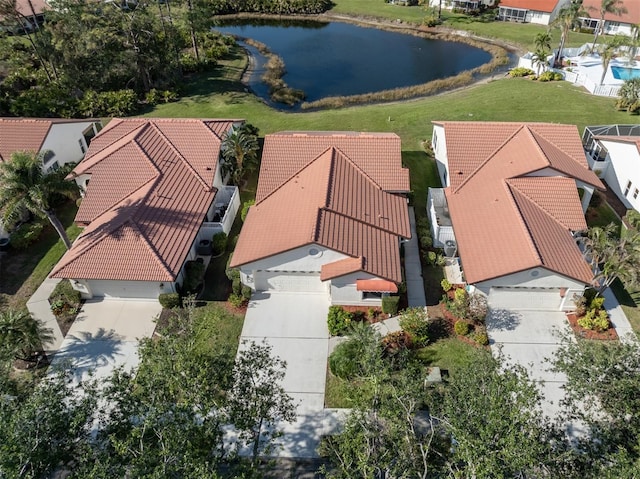 bird's eye view with a water view