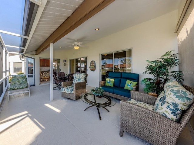 exterior space featuring ceiling fan and an outdoor living space