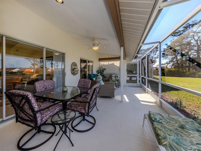 sunroom / solarium with ceiling fan