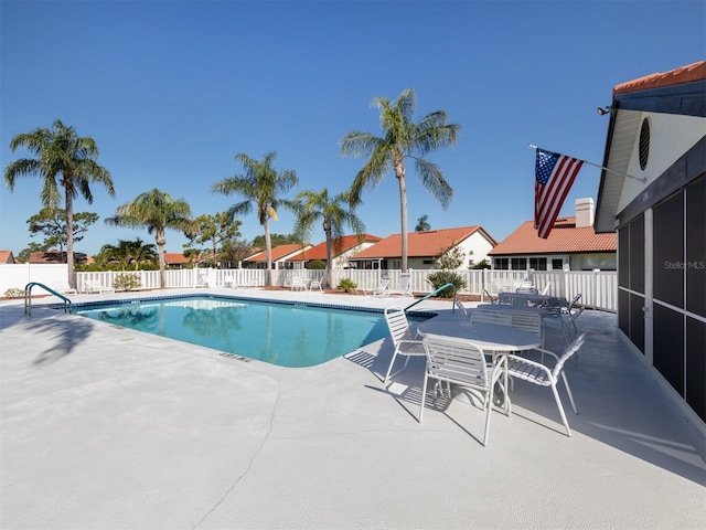 view of pool featuring a patio area