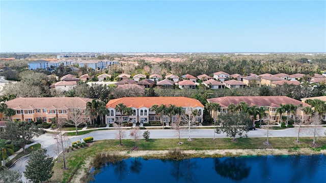 drone / aerial view with a water view