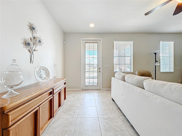 entryway featuring ceiling fan