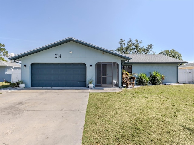 ranch-style house with a garage and a front yard