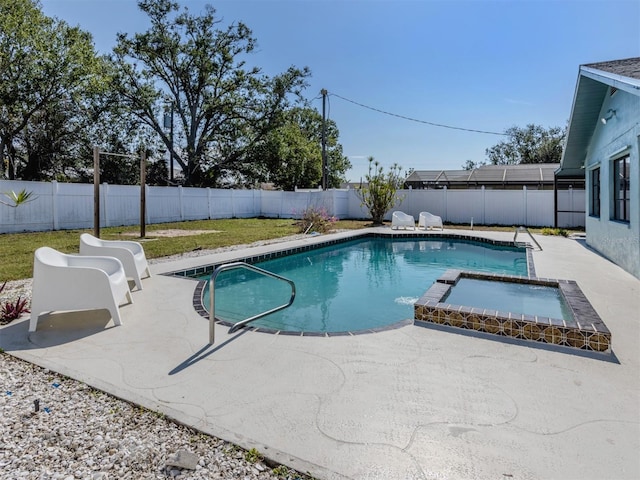 view of swimming pool featuring a patio area