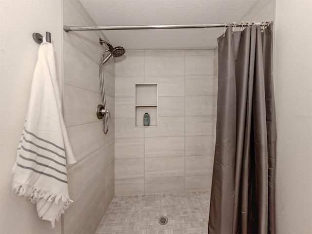 bathroom featuring a shower with curtain