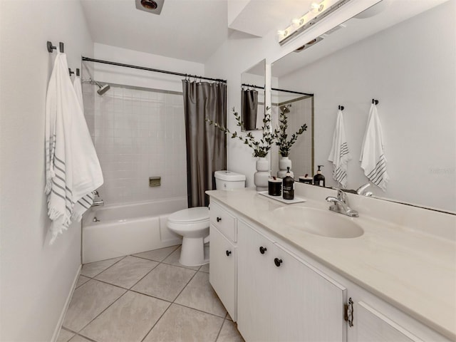 full bathroom featuring vanity, tile patterned floors, toilet, and shower / bath combo with shower curtain