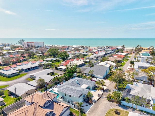 bird's eye view featuring a water view and a residential view