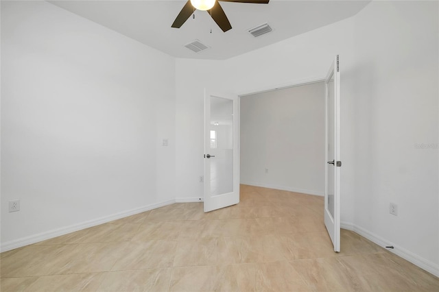 unfurnished room featuring ceiling fan