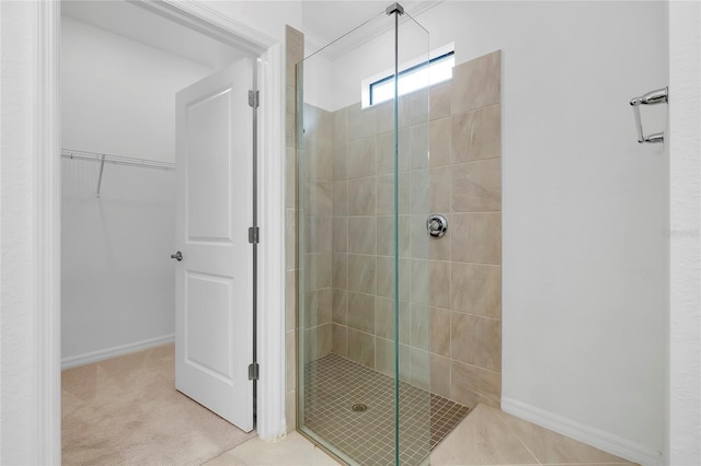 bathroom with a shower with shower door