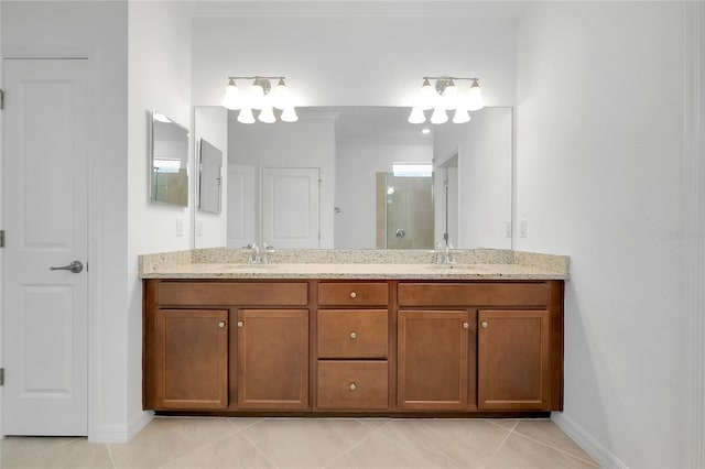 bathroom with ornamental molding, vanity, tile patterned floors, and walk in shower