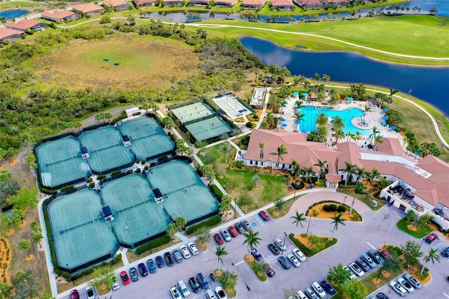 bird's eye view with a water view