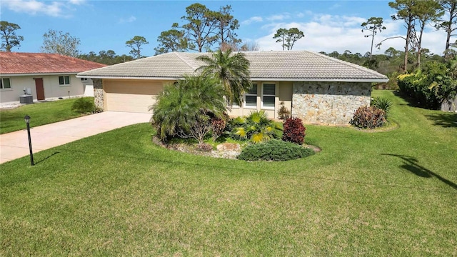 view of front facade featuring stone siding, a tiled roof, concrete driveway, and a front lawn