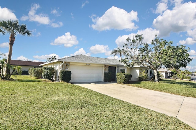 ranch-style house with a garage and a front lawn