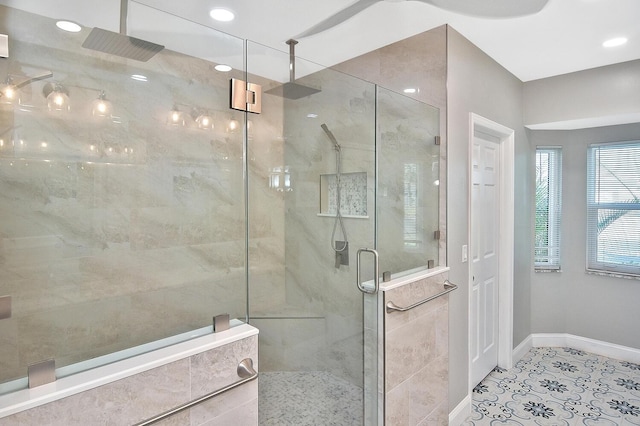 bathroom featuring tile patterned floors and walk in shower