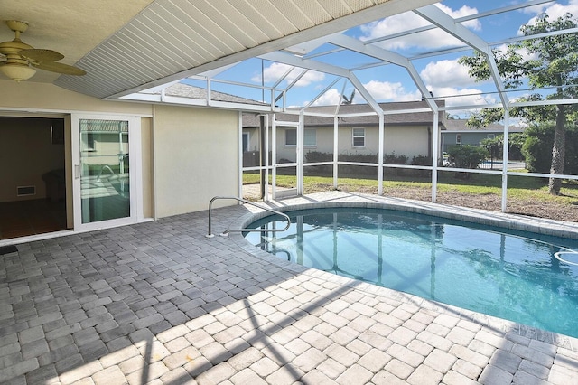 view of pool featuring a lanai and a patio