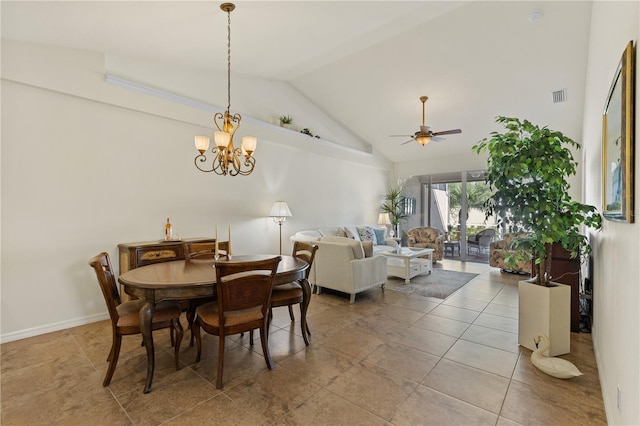 tiled dining area with ceiling fan with notable chandelier and high vaulted ceiling