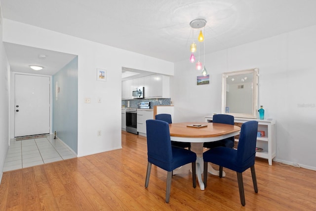 dining room featuring light hardwood / wood-style floors