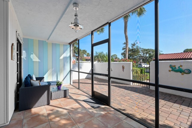 sunroom / solarium with a wealth of natural light