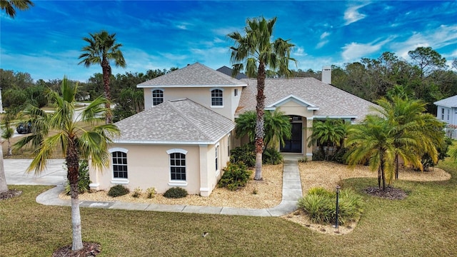 view of front of house with a front lawn