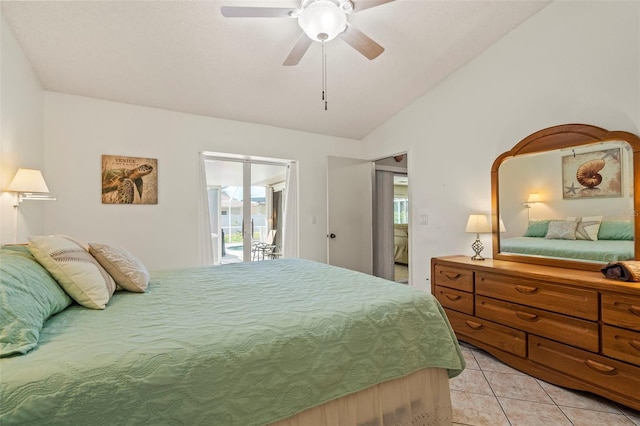 bedroom with access to exterior, lofted ceiling, ceiling fan, and light tile patterned floors