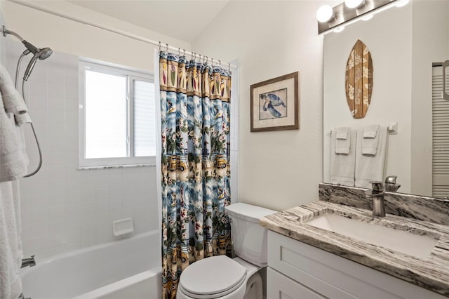 bathroom featuring shower / tub combo with curtain, vanity, and toilet