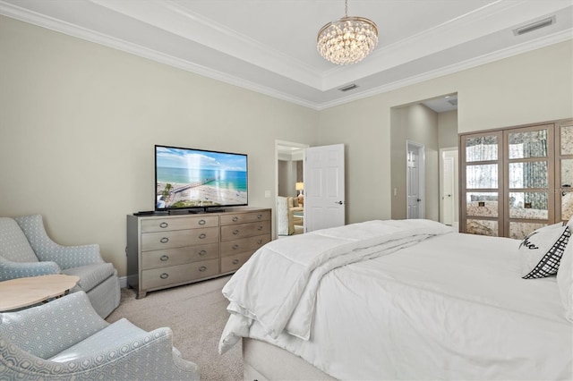 carpeted bedroom with an inviting chandelier, crown molding, visible vents, and a tray ceiling