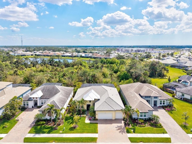 aerial view with a residential view and a water view