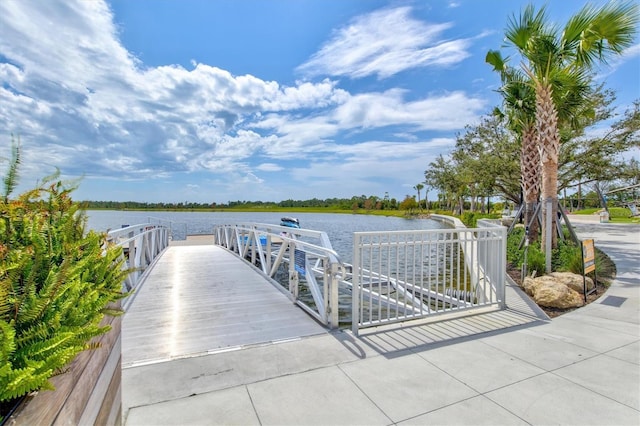 view of dock with a water view