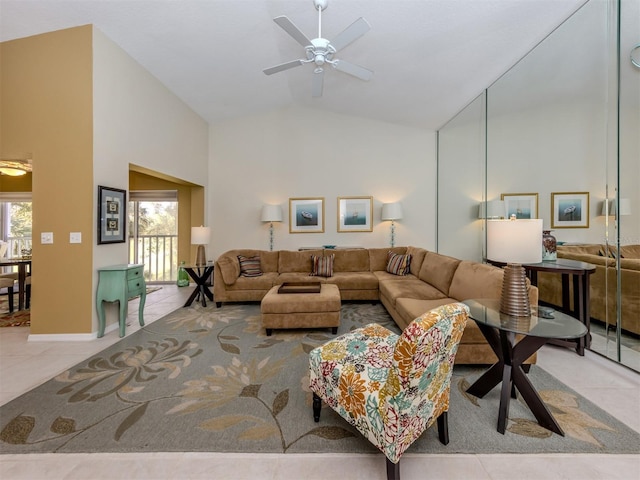 tiled living room featuring a wealth of natural light, high vaulted ceiling, and ceiling fan