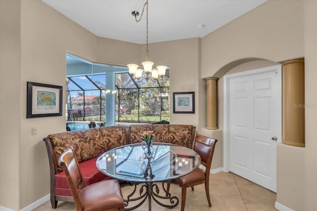 dining space with tile patterned flooring