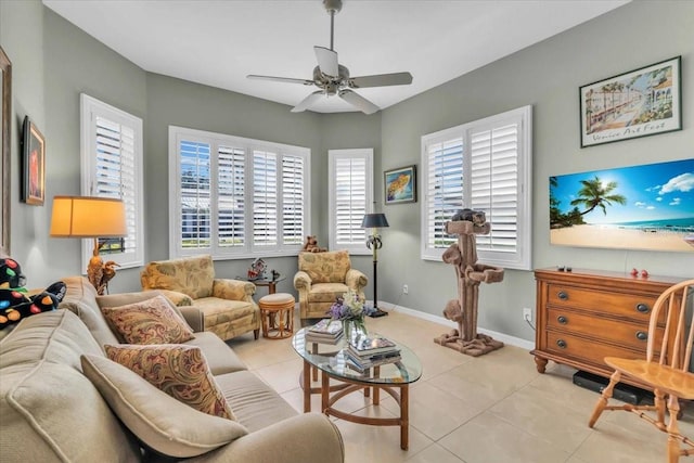 tiled living room featuring ceiling fan